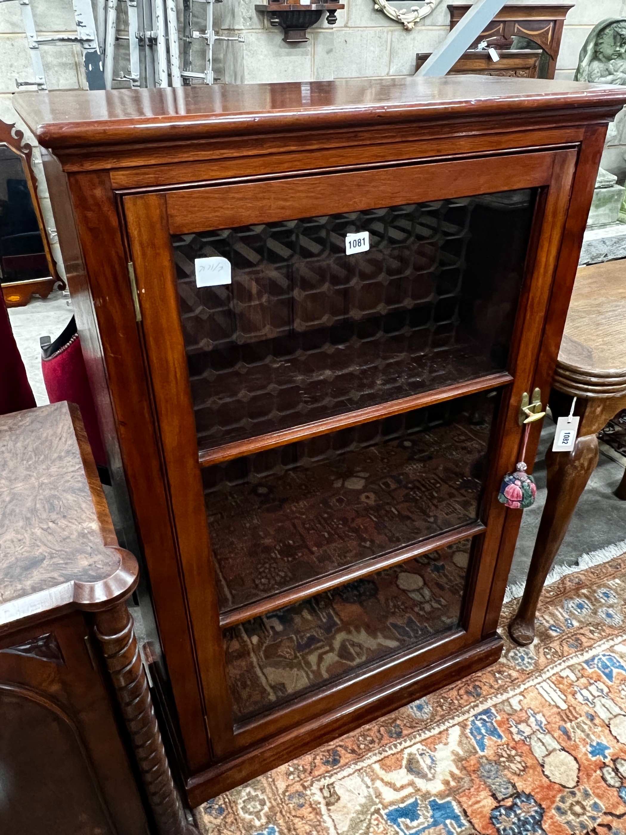 A Victorian mahogany glazed bookcase, length 73cm, width 34cm, height 115cm